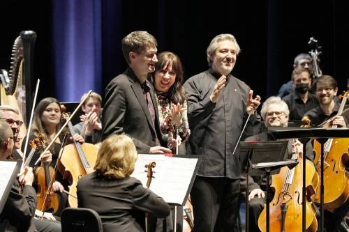 Steve Salnikowski / Chronic Creative
                                WSO associate concertmaster Karl Stobbe (from left), New Music Festival distinguished guest composer Missy Mazzoli and WSO music director Daniel Raiskin share a moment after a performance of her Violin Concerto (Procession).