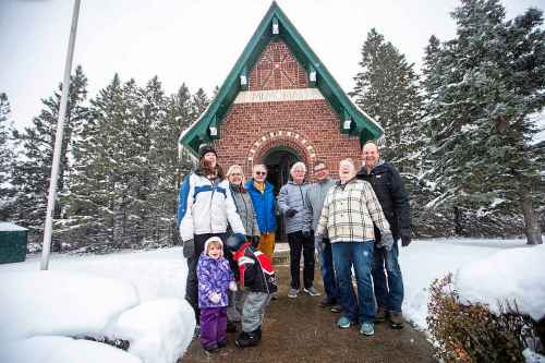 MIKAELA MACKENZIE / WINNIPEG FREE PRESS

Jennifer Ching-Faux (top left), Myra Amy-McElroy, Wilf Klippenstein, Harvey Kinsman, Brian McElroy, Shannon Holenski, Glen Holenski, Sienna Faux (two, bottom left), and Kip Faux (four, bottom right) pose for a photo in front of the war memorial in Darlingford, Manitoba on Monday, Oct. 30, 2023. For Jen story.
Winnipeg Free Press 2023.