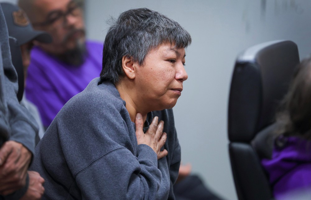 Rita Thomas, Noreen's sister-in-law and band councillor of O-Pipon-Na-Piwin Cree Nation (OPCN), holds her heart as she shares her personal fears of accused returning to their community after the charge was stayed. (Ruth Bonneville / Winnipeg Free Press)
