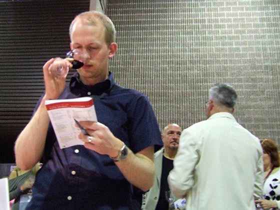 In this 2006 photo, Sir Ben Kingsley (centre) chats with Kenaston Wine Market proprietor Jim Jaworski (right) while I ponder my festival program. Sir Ben was in town filming You Kill Me with Téa Leoni. (Erin Shipley photo )