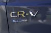 Logos are shown on the exterior of a 2024 Honda CR-V Hybrid in Sunnyvale, Calif., Monday, Dec. 11, 2023. THE CANADIAN PRESS/AP-Jeff Chiu