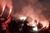 Lyon supporters hold flares ahead of a French League One soccer match between Lyon and Marseille at the Groupama stadium, outside Lyon, France, Sunday, Feb. 4, 2024. (AP Photo/Laurent Cipriani)