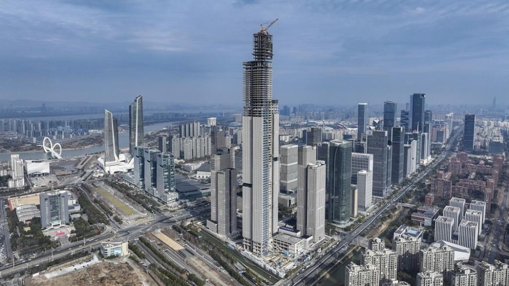 This photo released by Xinhua News Agency shows an aerial view of the construction site of the 2nd phase project of the Nanjing Financial City designed as an architectural complex comprising offices, hospitality, housing and commercial facilities in Nanjing, east China's Jiangsu Province, on Tuesday Jan. 16, 2024. Beijing on Wednesday, Feb. 7, 2024 replaced the head of the China Securities Regulatory Commission in an apparent effort to restore confidence in the stock market following major losses in domestic share prices. (Li Bo/Xinhua via AP)