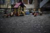 FILE - Shards of window glass are seen in the kindergarten at the scene where a helicopter crashed on civil infrastructure in Brovary, on the outskirts of Kyiv, Ukraine, Wednesday, Jan. 18, 2023. To start the Russian presidency of the U.N. Security Council the Russians chose one of the hottest issues of the Ukraine war — the fate of Ukrainian children taken to Russia. For the informal Security Council meeting, they chose as its briefer Maria Lvova-Belova, the Russian children's rights commissioner, who along with Putin is being sought by the International Criminal Court on war crimes charges. (AP Photo/Daniel Cole, File)