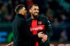 Leverkusen coach Xabi Alonso, left, and Leverkusen's Borja Iglesias high-five each other after the win in the Bundesliga soccer matdh between SV Darmstadt 98 and Bayer Leverkusen at Merck-Stadion am Böllenfalltor stadium in Darmstadt, Germany, Saturday Feb. 3, 2024. (Uwe Anspach/dpa via AP)