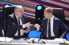 UEFA President Aleksander Ceferin, right, talks with member of executive committee Karl-Erik Nilsson during the 48th UEFA congress , Thursday, Feb. 8, 2024 in Paris. (AP Photo/Christophe Ena)