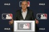 FILE - Major League Baseball commissioner Rob Manfred speaks during a news conference after an owners meeting in Arlington, Texas, Thursday, Nov. 16, 2023. MLB commissioner Rob Manfred said he would be disappointed if the Oakland Athletics don't open their proposed Las Vegas ballpark at the start of the 2028 season and expressed skepticism about big leaguers appearing in that year's Olympics, during a news conference following an owners meeting in Orlando, Fla., Thursday Feb. 8, 2024.(AP Photo/LM Otero, File)
