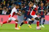 PSG's Neymar, centre, is challenged by Reims' Alaixys Romao, left and Reims' Aly Ndom during the French League One soccer match in Paris, France, Wednesday, Sept. 26, 2018. Pacific FC has signed French midfielder Aly Ndom to a two-year contract.THE CANADIAN PRESS/AP, Michel Euler