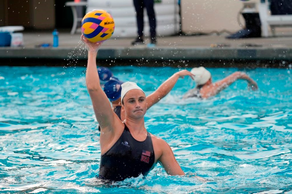 Two-time Olympic gold medalist and attacker Maddie Musselman trains with the U.S. women's water polo team at the Long Beach City College in Long Beach, Calif., on Thursday, Jan. 18, 2024. (AP Photo/Damian Dovarganes)