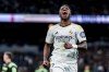 Real Madrid's Vinicius Junior reacts during a Spanish La Liga soccer match between Real Madrid and Girona at the Santiago Bernabeu stadium in Madrid, Spain, Saturday, Feb. 10, 2024. (AP Photo/Manu Fernandez)