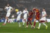 Roma's Gianluca Mancini, second right, heads the ball as scores against Inter during the Italian Serie A soccer match between Roma and Inter Milan at Rome's Olympic stadium, Saturday, Feb. 10, 2024. (AP Photo/Alessandra Tarantino)