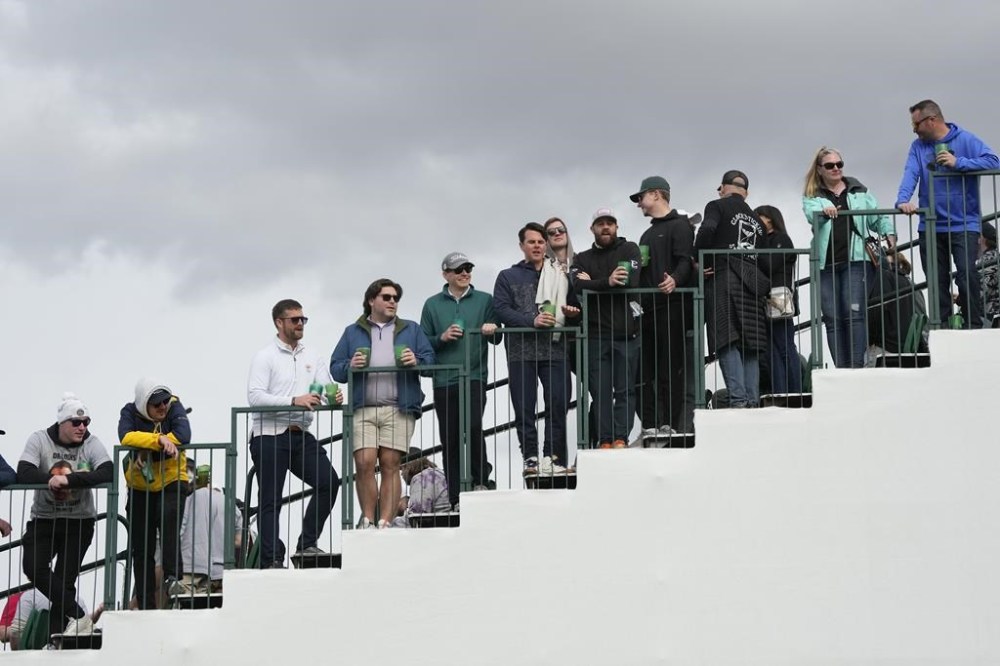 Fans in the gallery watch from near the 17th tee during the second round of the Phoenix Open golf tournament Friday, Feb. 9, 2024, in Scottsdale, Ariz. (AP Photo/Ross D. Franklin)