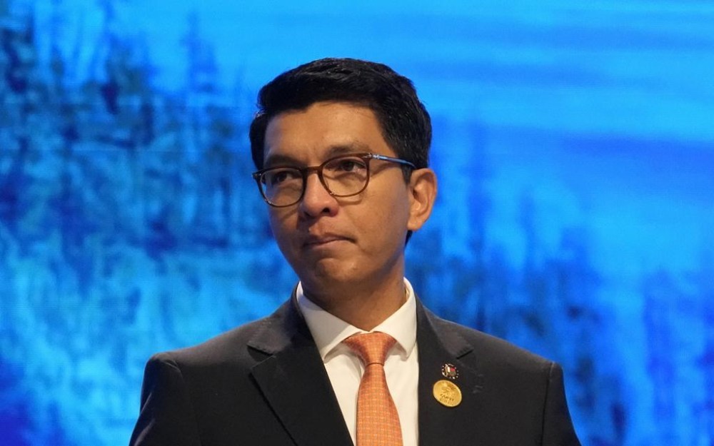 FILE - Andry Nirina Rajoelina, president of Madagascar, speaks at the COP27 U.N. Climate Summit, Tuesday, Nov. 8, 2022, in Sharm el-Sheikh, Egypt. Madagascar’s Parliament has passed a law allowing for the chemical and in some cases surgical castration of those found guilty of the rape of a minor. It has prompted criticism from international rights groups but has also found support from activists in the country who say it’s an appropriate deterrent to try and curb a “rape culture.” (AP Photo/Peter Dejong, File)