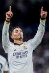 Real Madrid's Jude Bellingham celebrates after scoring his side's third goal during a Spanish La Liga soccer match between Real Madrid and Girona at the Santiago Bernabeu stadium in Madrid, Spain, Saturday, Feb. 10, 2024. (AP Photo/Manu Fernandez)