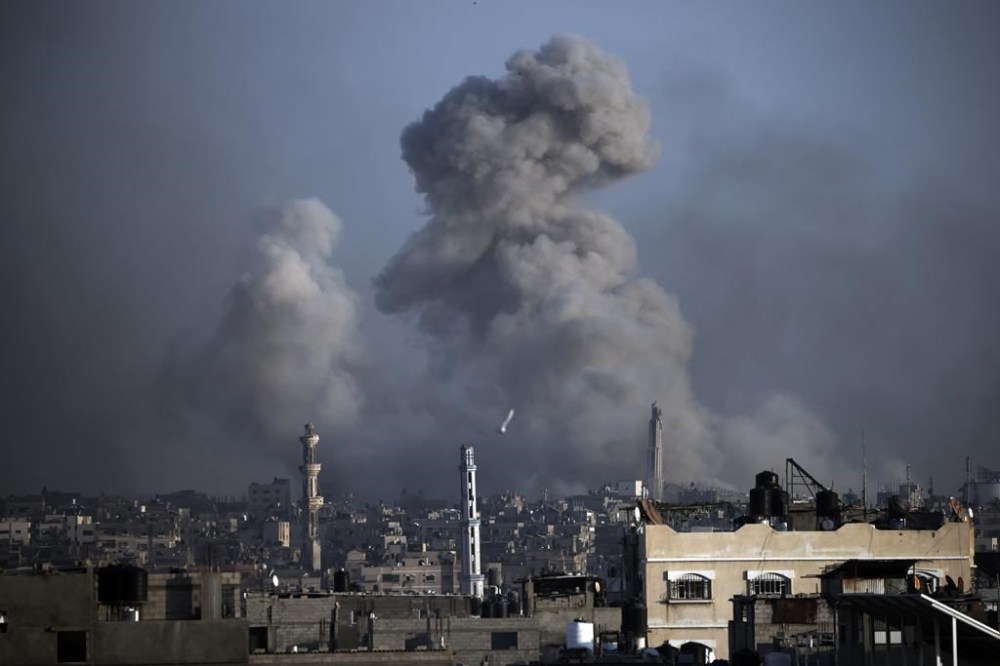 FILE - Smoke rises following Israeli bombardments in Khan Younis, southern Gaza Strip, on Jan. 17, 2024. Judges in the Netherlands on Monday Feb. 12, 2024 ordered the Dutch government to halt the export of fighter jet parts to Israel, citing a clear risk of violations of international law. (AP Photo/Mohammed Dahman, File)