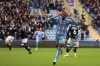 Coventry City's Haji Wright celebrates scoring their side's second goal of the game during the English League Championship match at the Coventry Building Society Arena, in Coventry, England, Sunday Feb. 11, 2024. Wright, who plays for Coventry City in England’s second-tier Championship, took part in an impromptu on-field game of rock, paper, scissors with teammate Callum O’Hare to determine who took a penalty in the team’s match against Millwall. Wright won it and converted the spot kick by sending the goalkeeper the wrong way, setting Coventry on course for a 2-1 victory on Sunday. (Nigel French/PA via AP)