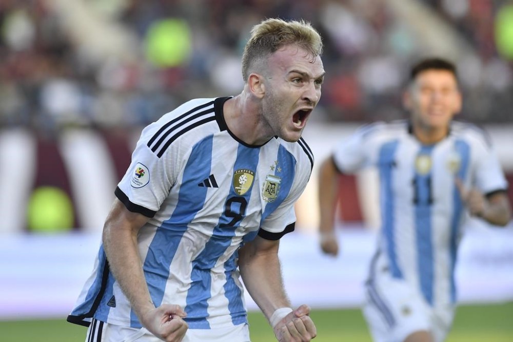 Argentina's Luciano Gondou celebrates after scoring his side's opening goal against Brazil during South America's under-23 pre-Olympic tournament soccer match at Brigido Iriarte stadium in Caracas, Venezuela, Sunday, Feb. 11, 2024. Argentina won 1-0 and qualified to the 2024 Paris Summer Olympics. (AP Photo/Matias Delacroix)