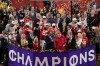 Kansas City Chiefs head coach Andy Reid, center right, lifts the Vince Lombardi Trophy after the team's victory over the San Francisco 49ers in the NFL Super Bowl 58 football game Sunday, Feb. 11, 2024, in Las Vegas. (AP Photo/David J. Phillip)