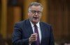 Piapot First Nation is demanding an apology from a Conservative MP after he said First Nations are burning down water treatment plants because they're frustrated with the Liberals. Conservative MP Kevin Waugh rises during Question Period in the House of Commons, in Ottawa, Tuesday, April 13, 2021. THE CANADIAN PRESS/Adrian Wyld