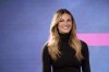 Erin Andrews smiles at a news conference announcing Tiger Woods' new clothing line, called Sun Day Red, ahead of the Genesis Open golf tournament, Monday, Feb. 12, 2024, in the Pacific Palisades area of Los Angeles. (AP Photo/Eric Thayer)