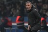 PSG's head coach Luis Enrique reacts during the French League One soccer match between Paris Saint-Germain and Lille at the Parc des Princes stadium in Paris, France, Saturday, Feb. 10, 2024. (AP Photo/Thibault Camus)