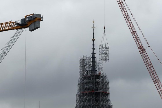 Scaffolding being removed around the spire of Notre Dame de Paris cathedral on Monday. (AP Photo/Aurelien Morissard)