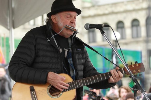 Neil Young is taking his band Crazy Horse back on the road. Nearly a decade after their last full-scale tour, the 78-year-old musician says he's moving ahead with 16 shows across North America, including one in Toronto. Young performs on the front lawn of the legislature in Victoria, B.C., on Saturday, February 25, 2023. THE CANADIAN PRESS/Chad Hipolito