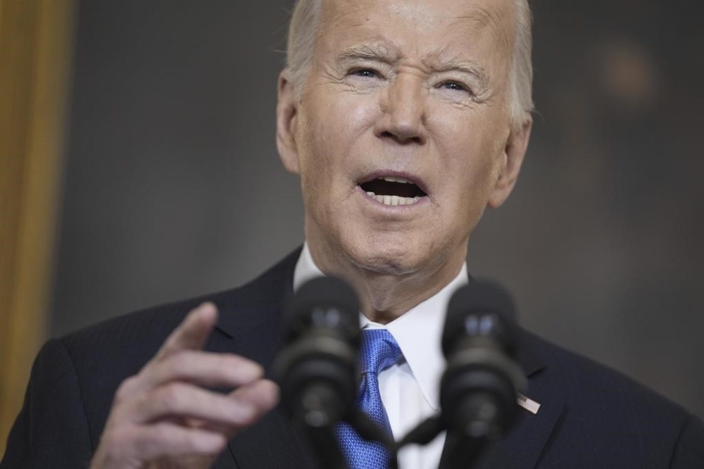 President Joe Biden delivers remarks on a $95 billion Ukraine Israel aid package being debated in Congress, in the State Dining Room of the White House, Tuesday, Feb. 13, 2024, in Washington. (AP Photo/Evan Vucci)