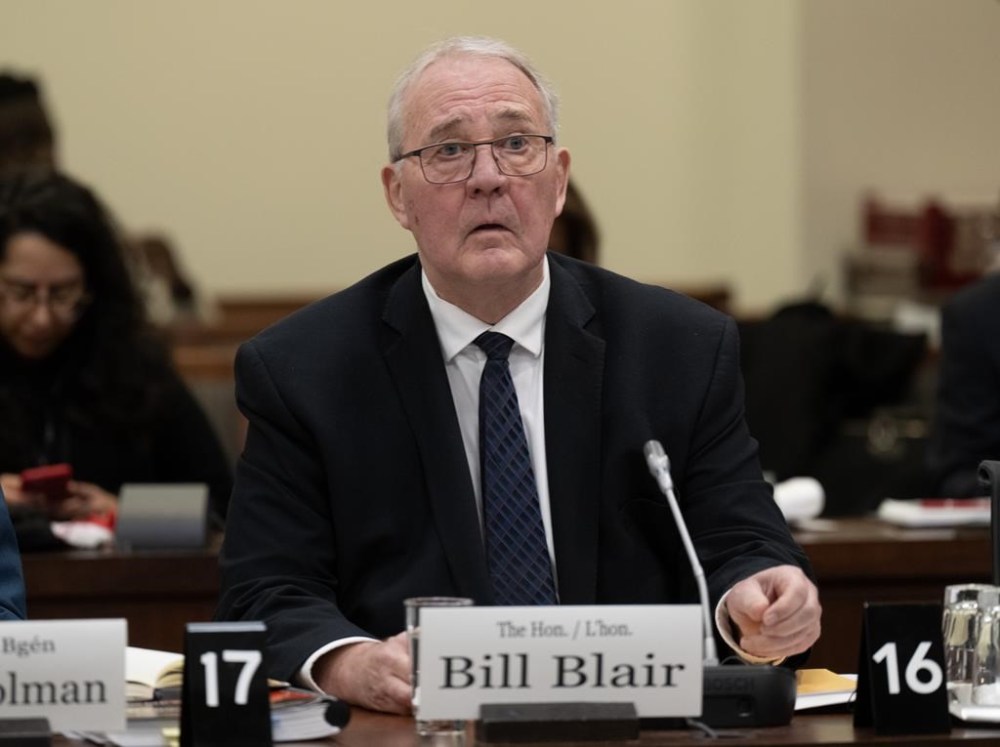 Defence Minister Bill Blair waits to appear as a witness at the National Defence committee, Monday, Feb. 12, 2024 in Ottawa. Blair says Canada will send Ukraine $60 million to support its F-16 fighter aircraft. THE CANADIAN PRESS/Adrian Wyld