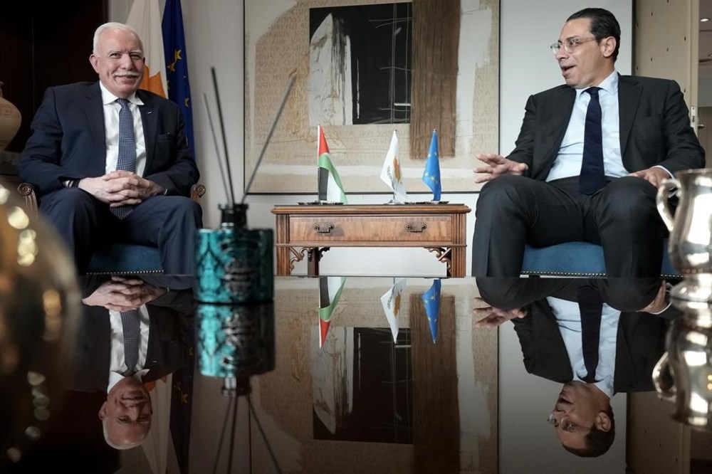 Cyprus' foreign minister Constantinos Kombos meets his Palestinian counterpart Riyad al-Maliki in capital Nicosia, Cyprus, Wednesday, Feb. 14, 2024. Al-Maliki is in Cyprus as the east Mediterranean island nation continues to rally International support behind is initiative to set up a maritime humanitarian aid corridor to Gaza. (AP Photo/Petros Karadjias)
