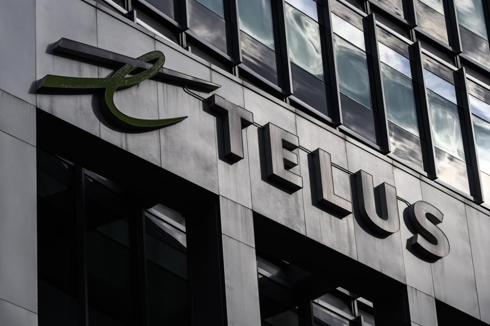 Telus Corp. says it awaits the CRTC's eventual decision on the rates smaller internet companies could end up paying larger carriers to sell services over their networks before deciding whether to adjust network spending plans. The Telus offices are seen in Ottawa on Friday, Aug. 4, 2023. THE CANADIAN PRESS/Justin Tang