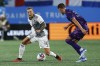 Toronto FC forward Federico Bernardeschi, left, battles Charlotte FC midfielder Andrew Privett for the ball in the first half of an MLS soccer match in Charlotte, N.C., Wednesday, Oct. 4, 2023. Italian star Federico Bernardeschi scored as Toronto FC tied Real Salt Lake 1-1 Wednesday in MLS pre-season play. THE CANADIAN PRESS/AP, Nell Redmond)
