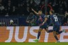 PSG's Kylian Mbappe, left, celebrates with PSG's Bradley Barcola after scoring his side's opening goal during the Champions League round of 16 first leg soccer match between Paris Saint-Germain and Real Sociedad, at the Parc des Princes stadium in Paris, France, Wednesday, Feb. 14, 2024. (AP Photo/Christophe Ena)