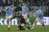 Lazio's Matteo Guendouzi, left, Munich's Jamal Musiala, center, and Lazio's Taty Castellanos, right, fight for the ball during a Champions League round of 16 first leg soccer match between Lazio and Bayern Munich, at Rome's Olympic Stadium, Wednesday, Feb. 14, 2024. (Alfredo Falcone/LaPresse via AP)