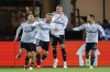 Molde's Rafał Augustyniak, foreground left, celebrates with his teammates after scoring, during the Europa Conference League soccer match between Molde and Legia Warszawa, at Aker Stadion, in Molde, Norway, Thursday, Feb. 15, 2024. (Svein Ove Ekornesvåg/NTB Scanpix via AP)