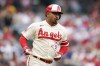 Los Angeles Angels' Eduardo Escobar reacts while running after hitting a line out to Detroit Tigers right fielder Kerry Carpenter during the second inning of a baseball game, Sunday, Sept. 17, 2023, in Anaheim, Calif. The Toronto Blue Jays agreed to terms with the veteran infielder on a minor-league contract Friday with an invite to spring training. THE CANADIAN PRESS/AP/Ryan Sun