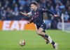 Manchester City's Jack Grealish, front, plays the ball during the Champions League, Round of Sixteen first leg, soccer match between FC Copenhagen and Manchester City in Copenhagen, Denmark, Tuesday, Feb. 13, 2024. (Liselotte Sabroe/Ritzau Scanpix via AP)