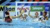 The Canadian women's water polo team qualified for the 2024 Paris Olympics after South Africa forfeited its allocated spot. Axelle Crevier of Canada, left, in action during the women's water polo match of New Zealand vs Canada played for the 9th place at the 19th FINA World Aquatics Championships in Szeged, Hungary, Thursday, June 30, 2022. THE CANADIAN PRESS/AP-MTI, Zsolt Czegledi