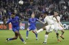 Lyon's Gift Orban, right, challenges for the ball with Nice's Jean-Clair Todibo during the French League One soccer match between Lyon and Nice at the Groupama stadium, outside Lyon, France, Friday, Feb. 16, 2024. (AP Photo/Laurent Cipriani)