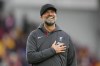 Liverpool's manager Jurgen Klopp celebrates after the English Premier League soccer match between Brentford and Liverpool at the Gtech Community Stadium in London, Saturday, Feb. 17, 2024. Liverpool won 4-1.(AP Photo/Kirsty Wigglesworth)