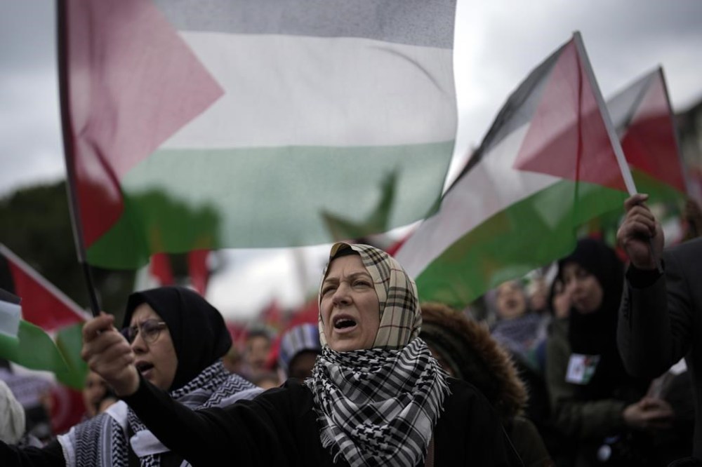 People protest in support of Palestinians in Gaza during a protest rally in Istanbul, Turkey, Saturday, Feb. 17, 2024, amid the ongoing war between Israel and Hamas. (AP Photo/Khalil Hamra)