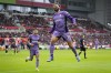 Liverpool's Mohamed Salah celebrates scoring his sides third goal during the English Premier League soccer match between Brentford and Liverpool at the Gtech Community Stadium in London, Saturday, Feb. 17, 2024. (AP Photo/Kirsty Wigglesworth)