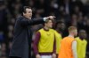 Aston Villa's head coach Unai Emery gestures to his players during the English Premier League soccer match between Fulham and Aston Villa at Craven cottage stadium in London, Saturday, Feb. 17, 2024. (AP Photo/Alastair Grant)
