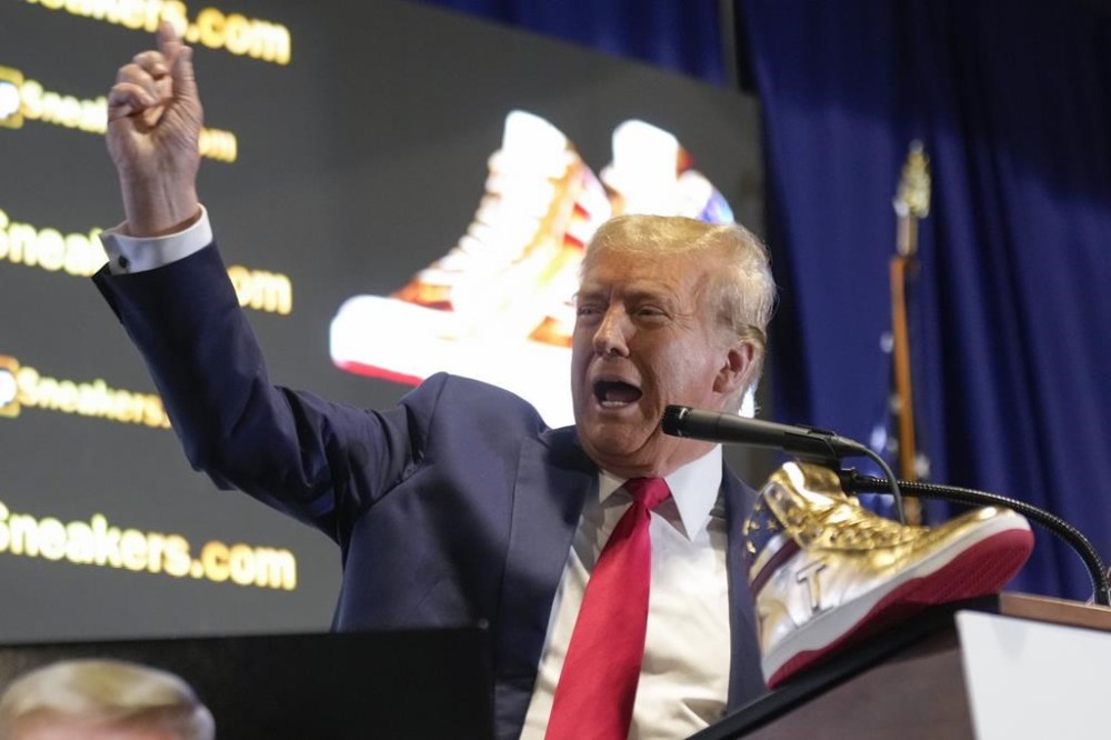 Republican presidential candidate former President Donald Trump attends Sneaker Con Philadelphia, an event popular among sneaker collectors, in Philadelphia, Saturday, Feb. 17, 2024. Trump announced a line of shoes bearing his name. (AP Photo/Manuel Balce Ceneta)