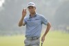 Will Zalatoris waves to the gallery on the 18th green during the third round of the Genesis Invitational golf tournament at Riviera Country Club, Saturday, Feb. 17, 2024, in the Pacific Palisades area of Los Angeles. (AP Photo/Ryan Sun)
