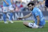Napoli's Khvicha Kvaratskhelia reacts during the Serie A soccer match between Napoli and Genoa at the Diego Maradona Stadium in Naples, Italy, Feb. 17, 2024. (Alessandro Garofalo/LaPresse via AP)