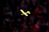 A model airplane flies inside the stadium during the Bundesliga soccer match between SC Freiburg and Eintracht Frankfurt in Freiburg, Germany, Sunday, Feb. 18, 2024. (Tom Weller/dpa via AP)