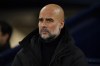 Manchester City's head coach Pep Guardiola arrives on the touchline for the English Premier League soccer match between Manchester City and Chelsea at the Etihad stadium in Manchester, England, Saturday, Feb. 17, 2024. (AP Photo/Dave Thompson)