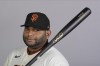 FILE - Pablo Sandoval of the San Francisco Giants baseball team, poses Feb. 18, 2020, in Scottsdale, Ariz. Sandoval, the 2012 World Series MVP, is returning to the San Francisco Giants on a minor league deal that includes an invitation to major league camp. (AP Photo/Darron Cummings, File)