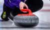 A rock crosses the hog line at the Scotties Tournament of Hearts in Calgary, Monday, Feb. 19, 2024.&nbsp;The honour system is in play at the Canadian women's curling championship when it comes to hog-line violations. THE CANADIAN PRESS/Jeff McIntosh